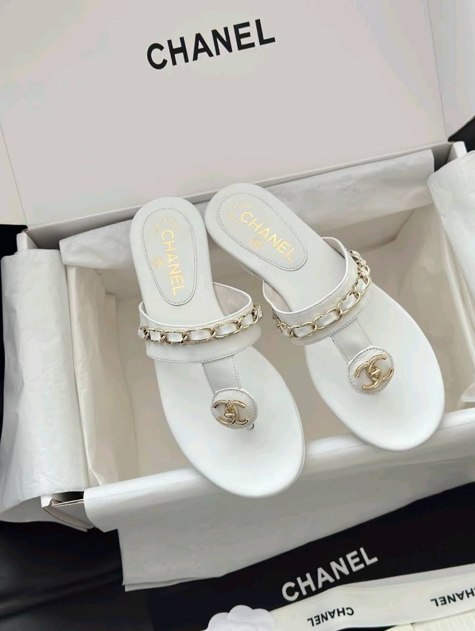 Luxury diamond-quilted flat slides with metal embellishments